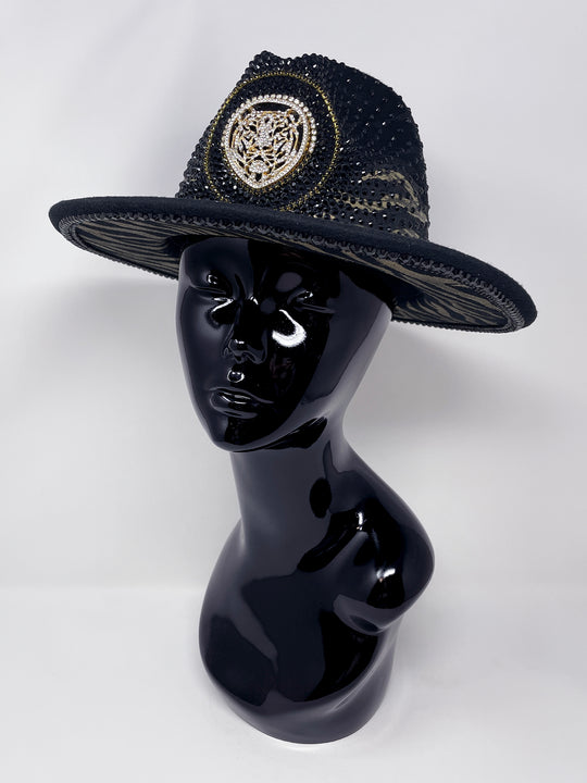 Short brim black fedora with black and metallic gold hand painted tiger print. Gold tiger motive centrepiece and crystal embellishments. Luxury fedora, rhinestones, statement fedora, unique headwear, animal print