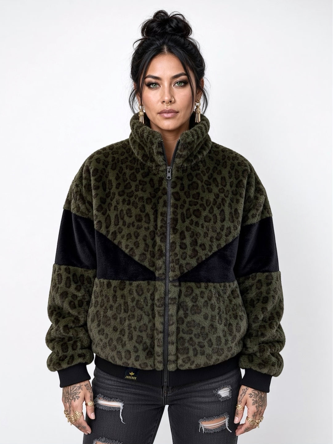 Forest green leopard print faux fur bomber jacket with contrasting black panels, oversized collar, front zip fastening, pockets and ribbed cuffs and ribbed waistband. Modelled with black ripped jeans. Plush faux fur, festival jacket, winter coat