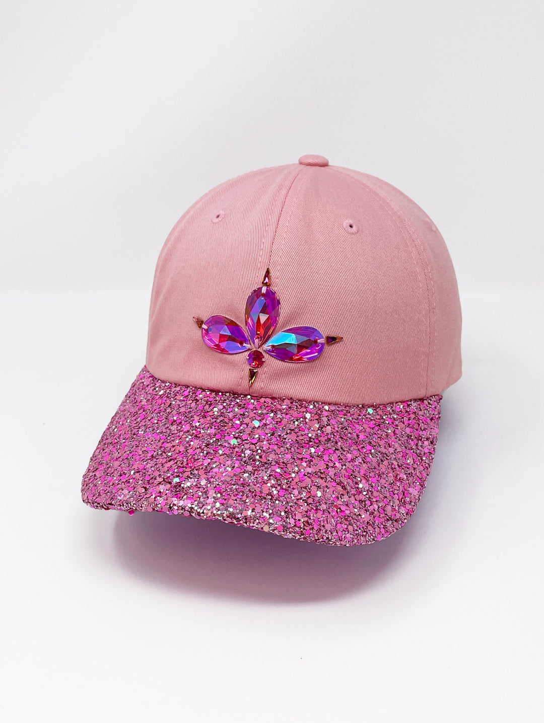 Light pink low profile cap with an embellished hot pink glitter mix peak and 3D Jukebox logo emblem centre front, stylish streetwear, eye catching accessory, buckle back, dusky pink, party hat, festival hat, urban, unique headwear, made in the UK