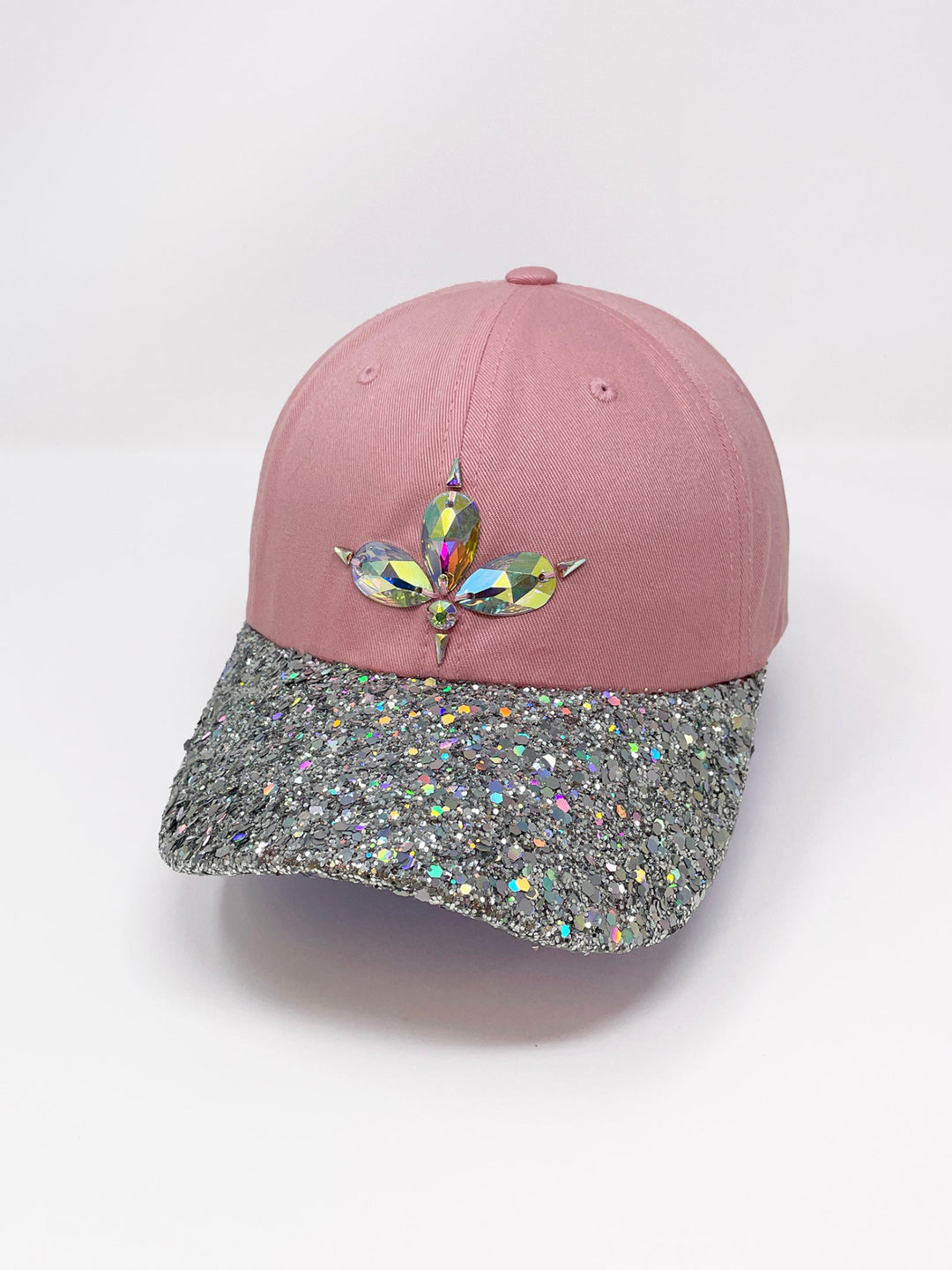 Light pink low profile curved peak cap with an embellished holographic silver glitter peak and 3D Jukebox logo emblem centre front, stylish streetwear, eye catching accessory, buckle back, iridescent, dusky pink, party hat, festival hat, urban