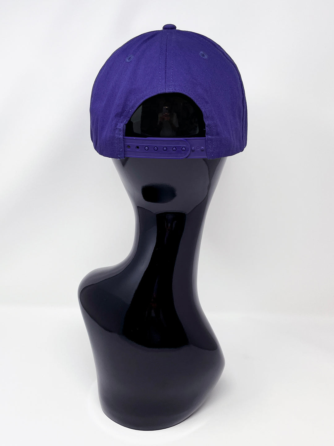 Purple flat peak cap with a vibrant pink chunky glitter peak. 3D Jukebox logo emblem centre front, stylish streetwear, eye catching accessory, adjustable, snapback, party hat, festival hat, rave, urban, crystals, festival fashion, glow, rhinestones, unique headwear, made in the UK