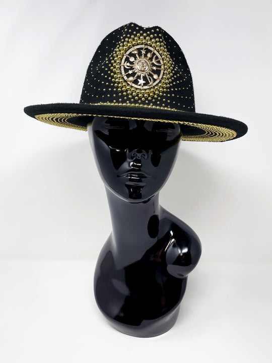 Short Brim black fedora hat with a gold metal sun and moon centre motif, embellished with a splash of gold pearl like rhinestones and crystals. gold splash, luxury fedora, made in the uk, handmade, statement hat, high end fashion, festival fedora, ibiza hat, festival outfit