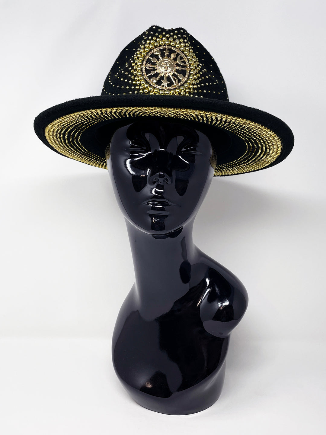 Short Brim black fedora hat with a gold metal sun and moon centre motif, embellished with a splash of gold pearl like rhinestones and crystals. gold splash, luxury fedora, made in the uk, handmade, statement hat, high end fashion, festival fedora, ibiza hat, festival outfit