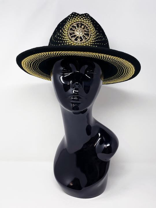 Short Brim black fedora hat with a gold metal sun and moon centre motif, embellished with a splash of gold pearl like rhinestones and crystals. gold splash, luxury fedora, made in the uk, handmade, statement hat, high end fashion, festival fedora, ibiza hat, festival outfit