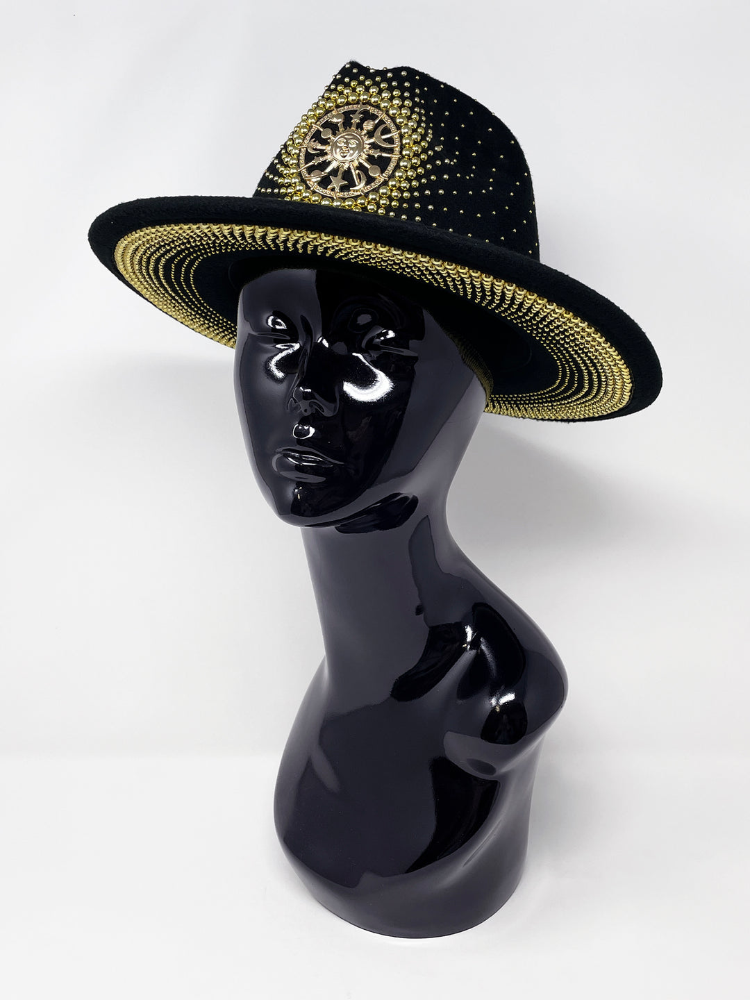 Short Brim black fedora hat with a gold metal sun and moon centre motif, embellished with a splash of gold pearl like rhinestones and crystals. gold splash, luxury fedora, made in the uk, handmade, statement hat, high end fashion, festival fedora, ibiza hat, festival outfit