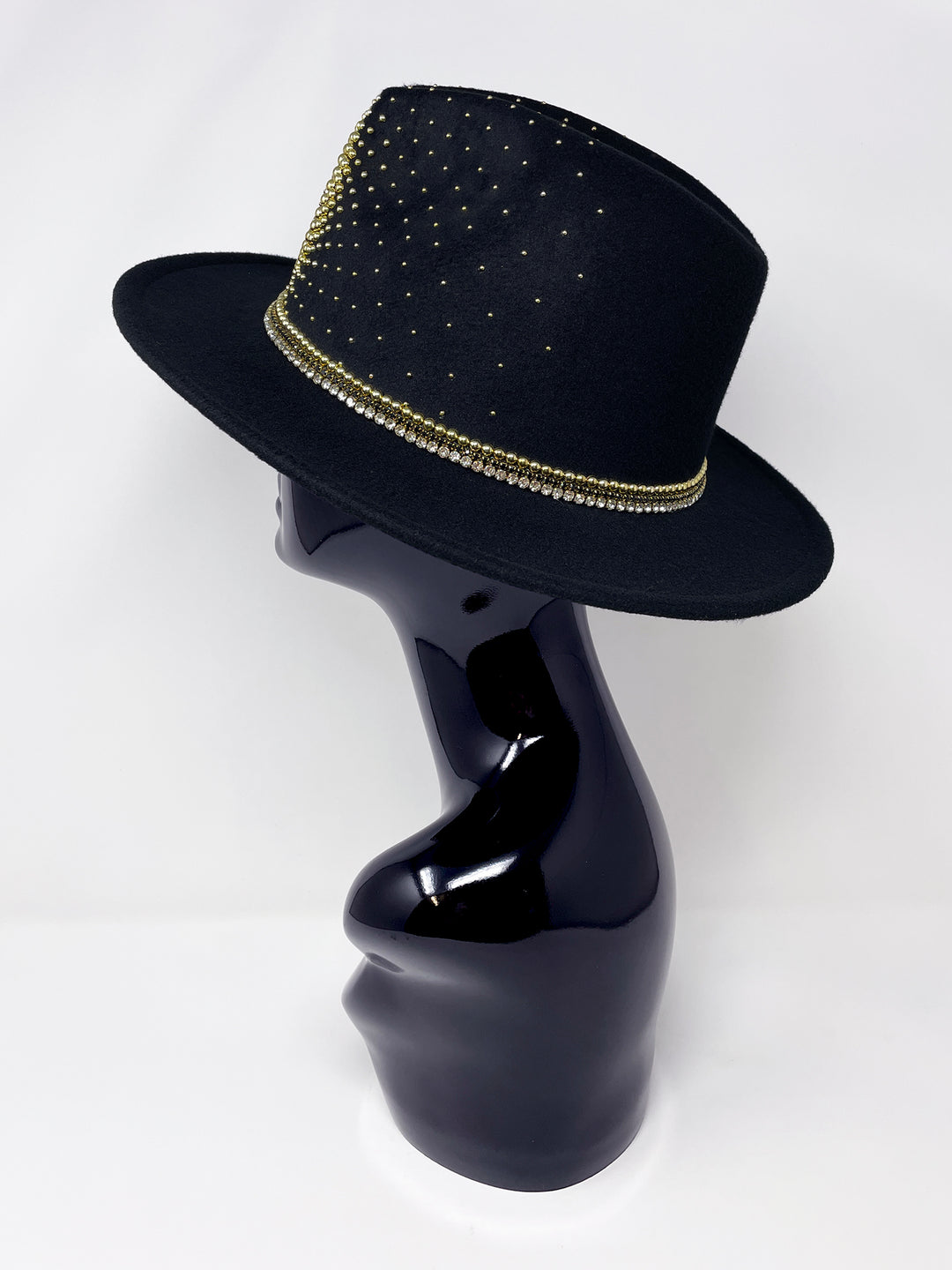 Short Brim black fedora hat with a gold metal sun and moon centre motif, embellished with a splash of gold pearl like rhinestones and crystals. gold splash, luxury fedora, made in the uk, handmade, statement hat, high end fashion, festival fedora, ibiza hat, festival outfit