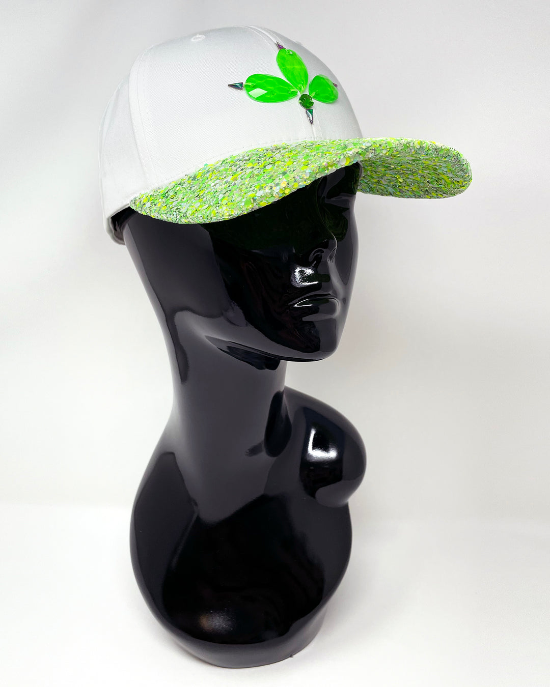 White curved peak cap with neon green UV glitter mix peak and 3D Jukebox logo emblem centre front, stylish streetwear, eye catching accessory, adjustable, snapback, Bridal hat, party hat, glow, festival hat, urban, crystals, rhinestones, unique headwear, made in the UK