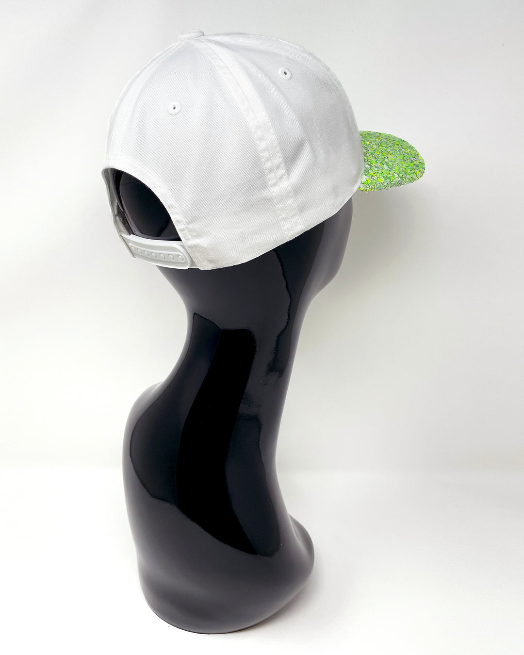 White curved peak cap with neon green UV glitter mix peak and 3D Jukebox logo emblem centre front, stylish streetwear, eye catching accessory, adjustable, snapback, Bridal hat, party hat, glow, festival hat, urban, crystals, rhinestones, unique headwear, made in the UK
