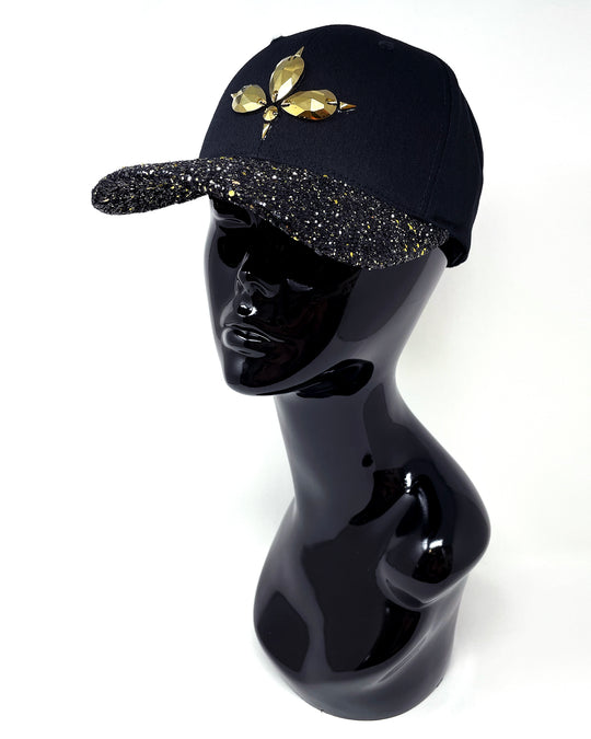Black curved peak cap with a gold and black glitter mix peak. 3D Jukebox logo emblem centre front, stylish streetwear, eye catching accessory, adjustable, snapback, party hat, halloween, festival hat, rave, urban, crystals, rhinestones, unique headwear, made in the UK