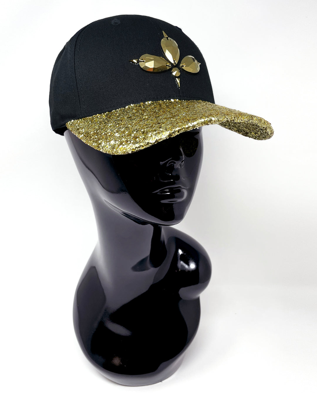 Black curved peak cap with a gold glitter peak. 3D Jukebox logo emblem centre front, stylish streetwear, eye catching accessory, adjustable, snapback, party hat, halloween, festival hat, urban, crystals, rhinestones, unique headwear, made in the UK