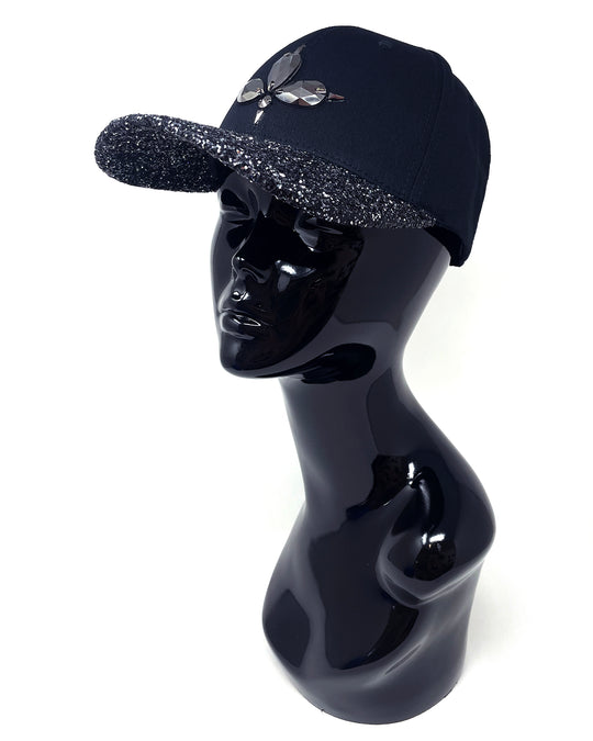 Black curved peak cap with gunmetal and black glitter mix peak. 3D Jukebox logo emblem centre front, stylish streetwear, eye catching accessory, adjustable, snapback, party hat, halloween, festival hat, urban, crystals, rhinestones, unique headwear, made in the UK