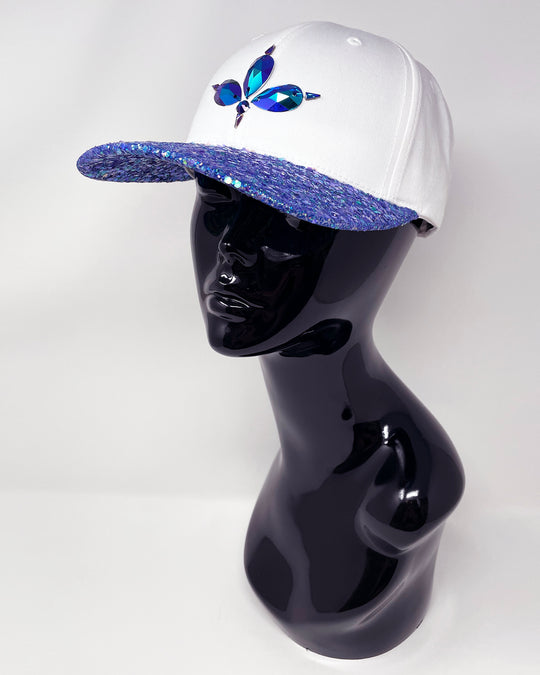 White curved peak cap with a blue violet glitter mix peak and 3D Jukebox logo emblem centre front, stylish streetwear, eye catching accessory, adjustable, snapback, Bridal hat, iridescent, party hat, festival hat, urban, unique headwear, made in the UK