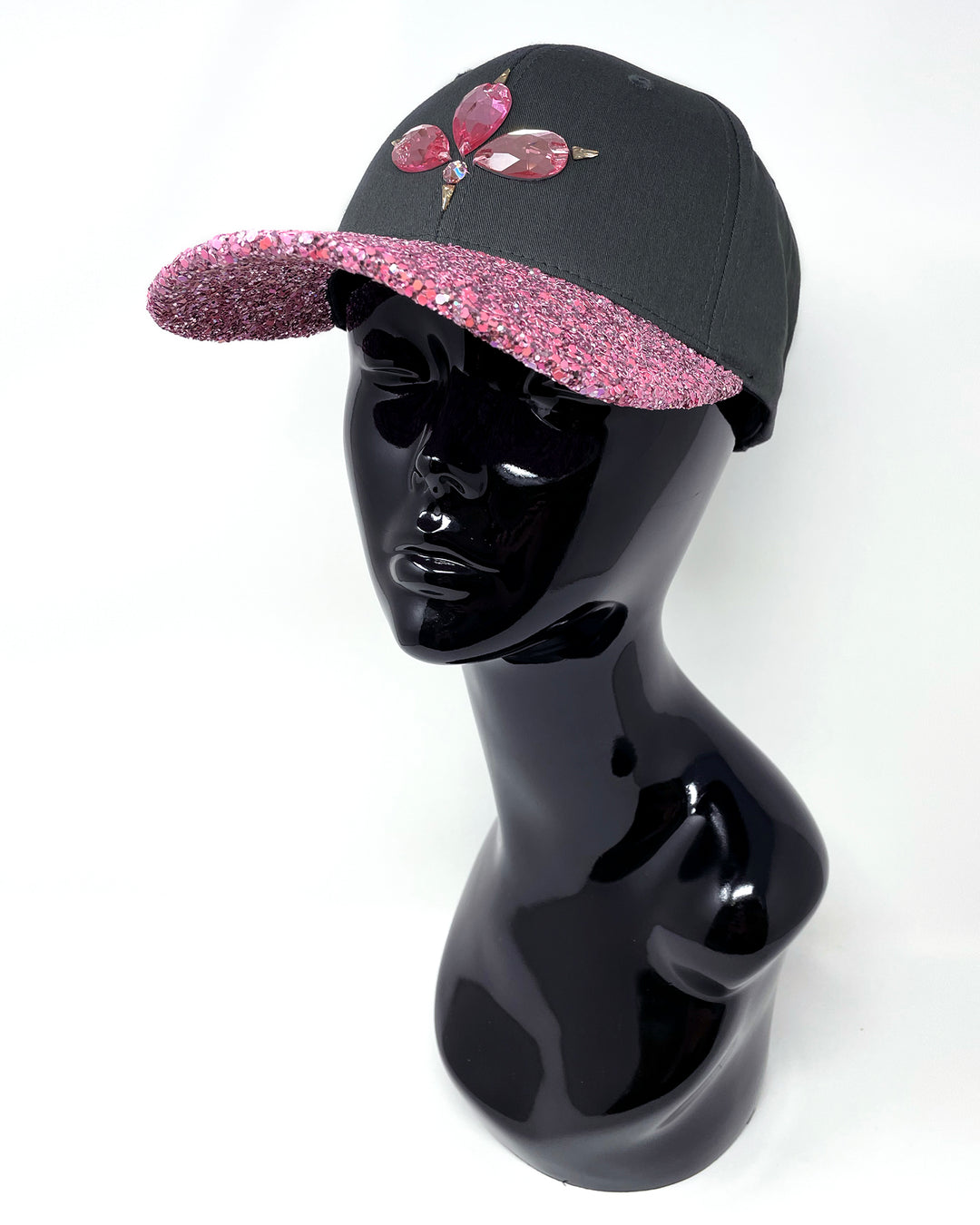 Charcoal grey curved peak cap with a pink glitter mix peak and 3D Jukebox logo emblem centre front, stylish streetwear, eye catching accessory, adjustable, snapback, party hat, festival hat, urban, unique headwear, made in the UK