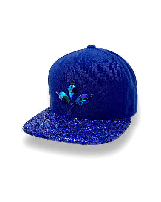 Blue flat peak cap with a blue chunky glitter peak. 3D Jukebox logo emblem centre front, stylish streetwear, eye catching accessory, adjustable, snapback, party hat, festival hat, rave, urban, crystals, Royal blue, electric blue, festival fashion, glow, rhinestones, unique headwear, made in the UK