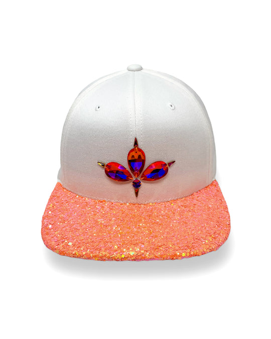 White flat peak cap with UV neon orange glitter peak. 3D Jukebox logo emblem centre front, stylish streetwear, eye catching accessory, adjustable, snapback, party hat, festival hat, rave, urban, crystals, Halloween, festival fashion, glow, rhinestones, unique headwear, made in the UK