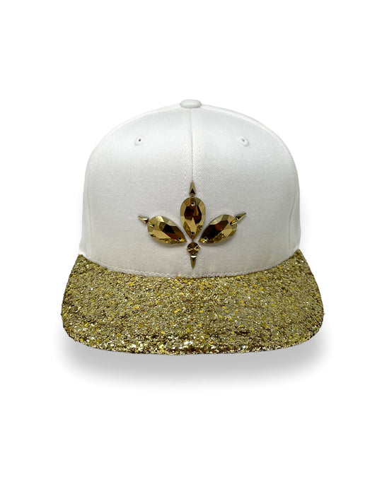 White flat peak cap with a metallic gold glitter peak. 3D Jukebox logo emblem centre front, stylish streetwear, eye catching accessory, adjustable, snapback, party hat, festival hat, rave, urban, crystals, Halloween, festival fashion, rhinestones, unique headwear, made in the UK