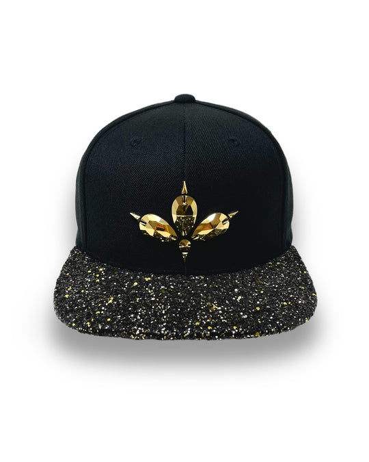Black flat peak cap with a gold and black glitter mix peak. 3D Jukebox logo emblem centre front, stylish streetwear, eye catching accessory, adjustable, snapback, party hat, festival hat, rave, urban, crystals, Halloween, festival fashion, rhinestones, unique headwear, made in the UK