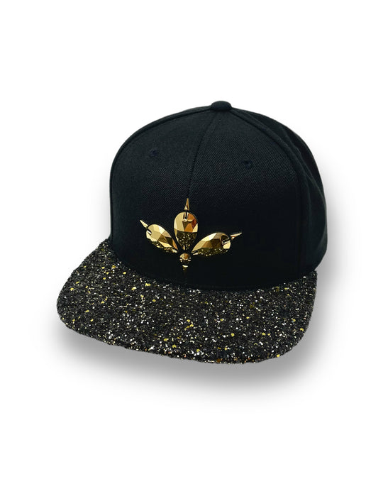 Black flat peak cap with a gold and black glitter mix peak. 3D Jukebox logo emblem centre front, stylish streetwear, eye catching accessory, adjustable, snapback, party hat, festival hat, rave, urban, crystals, Halloween, festival fashion, rhinestones, unique headwear, made in the UK